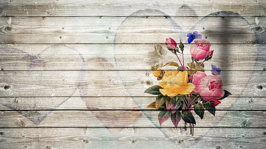 Vintage floral bouquet on rustic wooden background with heart