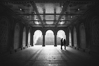 Silhouetted Couple in Grand Arched Hallway Black and White