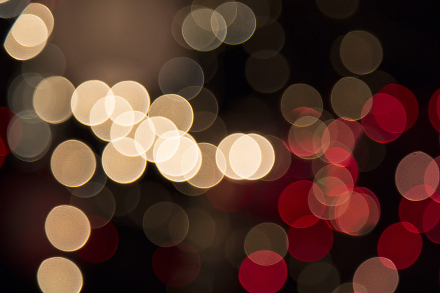 Abstract Bokeh Lights Background with Red and Gold Orbs