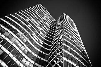 Low Angle Black and White Skyscrapers with Curved Glass Facades