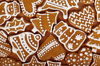 Top View of Decorated Gingerbread Cookies on Wooden Surface