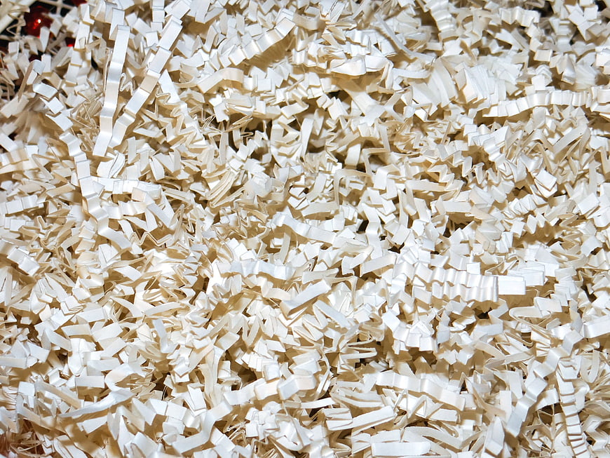 Close-up texture of shredded white paper strips