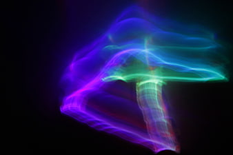 Abstract Neon Light Trails Forming Mushroom Shape