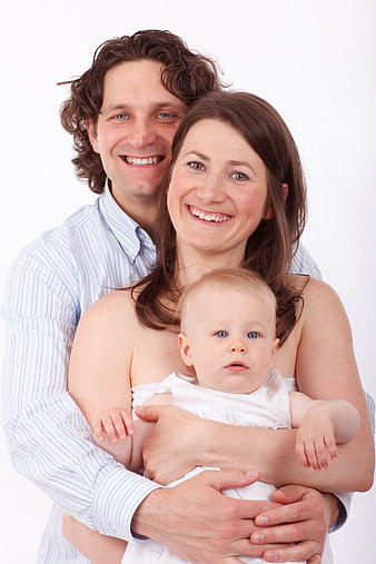 Happy Family Portrait with Baby on White Background