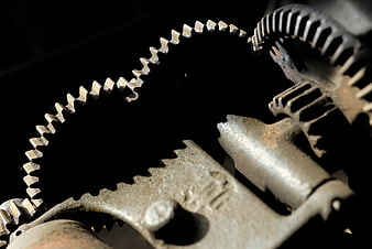 Close-up of rusty metal gears and chain mechanism