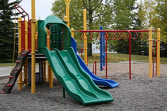 Empty Colorful Playground Equipment in Park