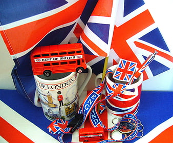 British souvenirs including mugs, flags, and red double-decker bus toys