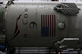 Falcon 9 Rocket Body with American Flag in Hangar