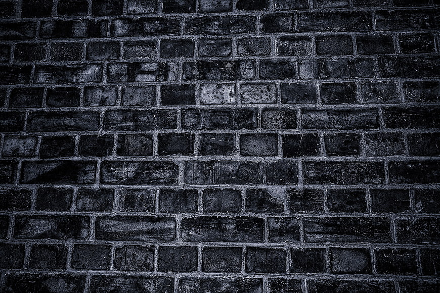 Dark Textured Black Brick Wall Background