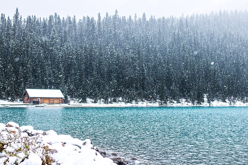 Snowy Lake Louise Cabin in Winter Landscape