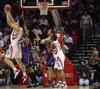 NBA Basketball Player Shooting Jump Shot in Arena