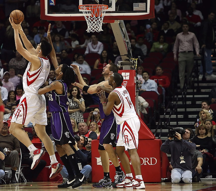 NBA Basketball Player Shooting Jump Shot in Arena