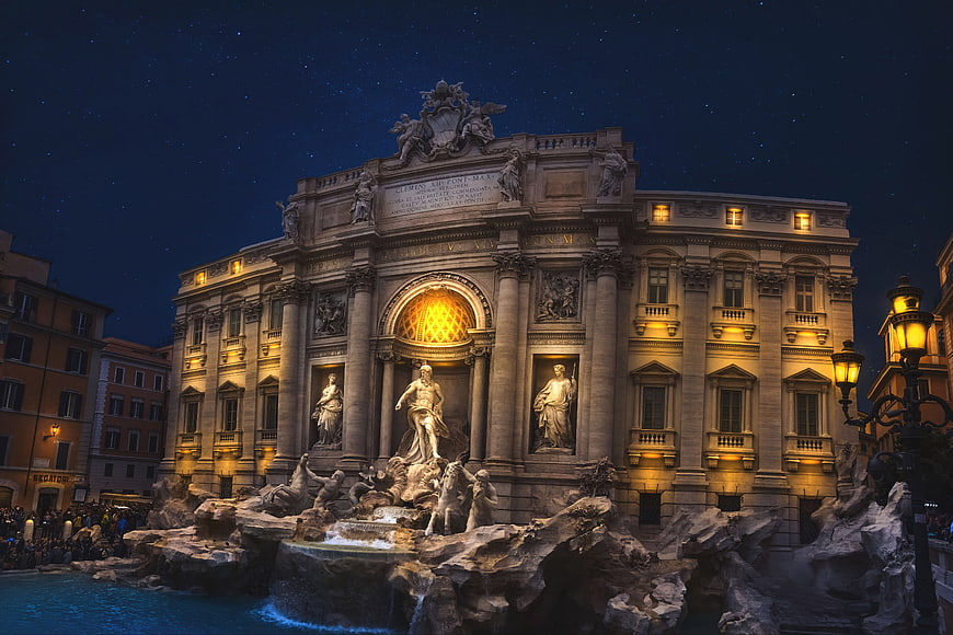 Trevi Fountain in Rome at Night with Starry Sky