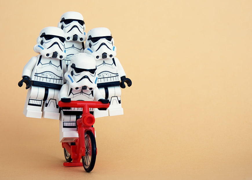 Lego Stormtroopers Riding a Red Bicycle