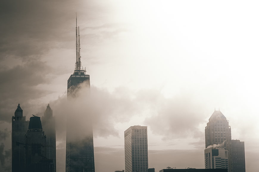 Foggy Chicago Skyline with Skyscrapers and Clouds
