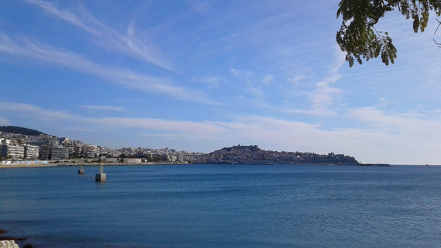 Coastal cityscape of Kavala, Greece with blue sea and sky