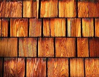 Close-up texture of warm brown wooden shingles