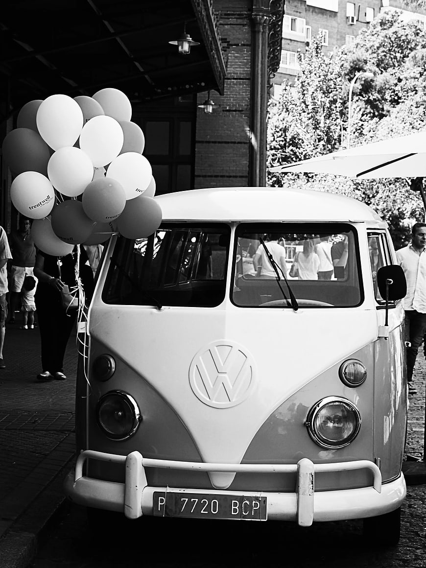 Vintage Volkswagen T1 Bus with Balloons in Black and White