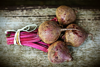 Fresh Beets with Stems on Rustic Wooden Background