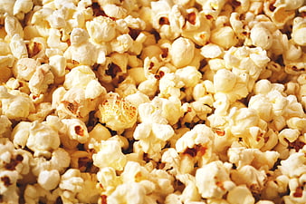Close-up of fluffy yellow buttered popcorn texture