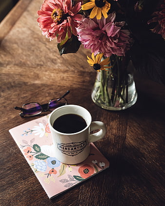 Cozy Morning Coffee Setup with Flowers and Notebook
