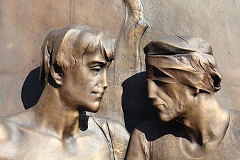 Bronze Statue of Two Men in Profile, One Blindfolded