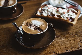 Cappuccino and Waffle on Rustic Wooden Table
