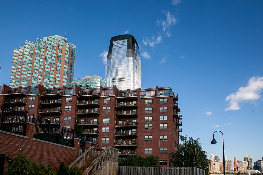 Urban Skyline with Brick Apartments and Glass Skyscrapers