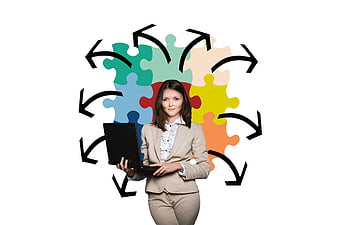 Businesswoman with laptop and colorful puzzle pieces background