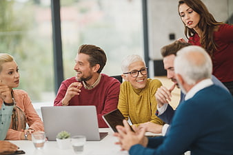 Diverse business team collaborating in modern office meeting