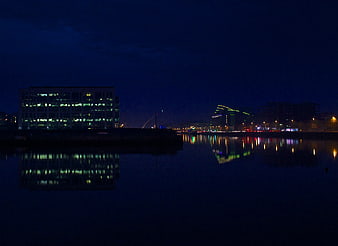Night Cityscape Reflected in Calm Water