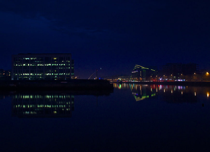 Night Cityscape Reflected in Calm Water