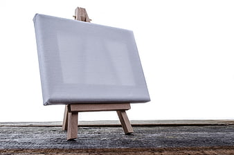 Blank Canvas on Wooden Easel with White Background