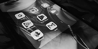 Black and White Close-Up of Android Smartphone Screen with Google Apps