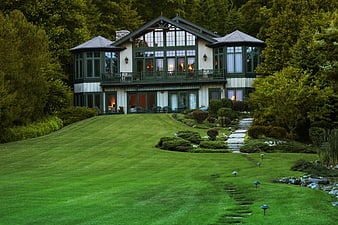 Luxury Lakeside Residence With Manicured Green Lawn And Garden Path