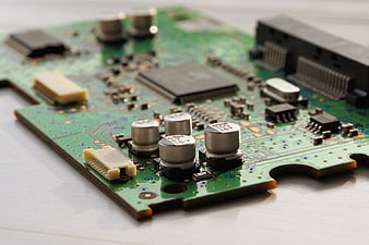 Close-up of green computer motherboard circuit board
