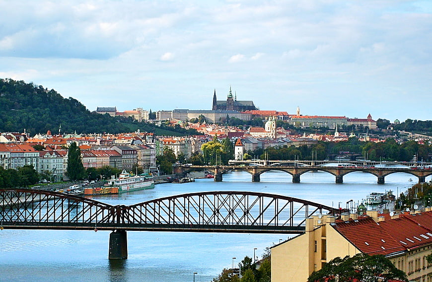 Panoramic view of Prague skyline with Vltava River and bridges