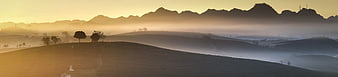 Panoramic Misty Mountain Landscape at Golden Hour
