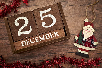 Wooden Christmas Calendar Showing December 25th with Santa Ornament