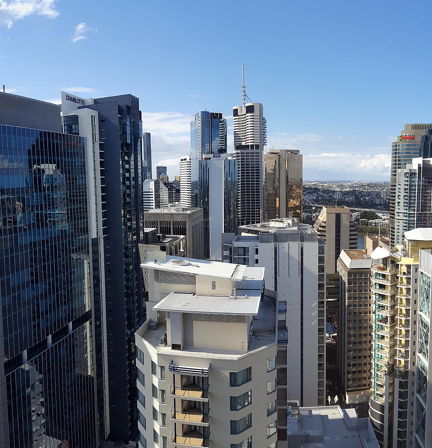 Brisbane City Skyline with Modern Skyscrapers and Blue Sky