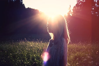 Woman Silhouette in Golden Hour Sunlight