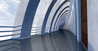 Modern concrete corridor with arches and brick wall