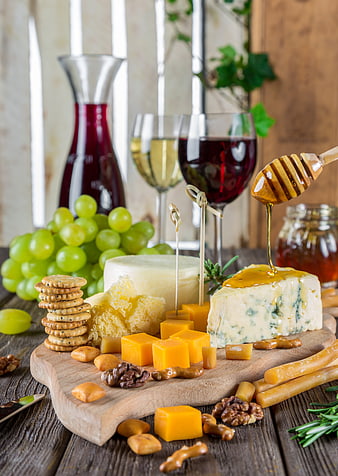 Rustic Cheese Board with Wine, Grapes, and Honey