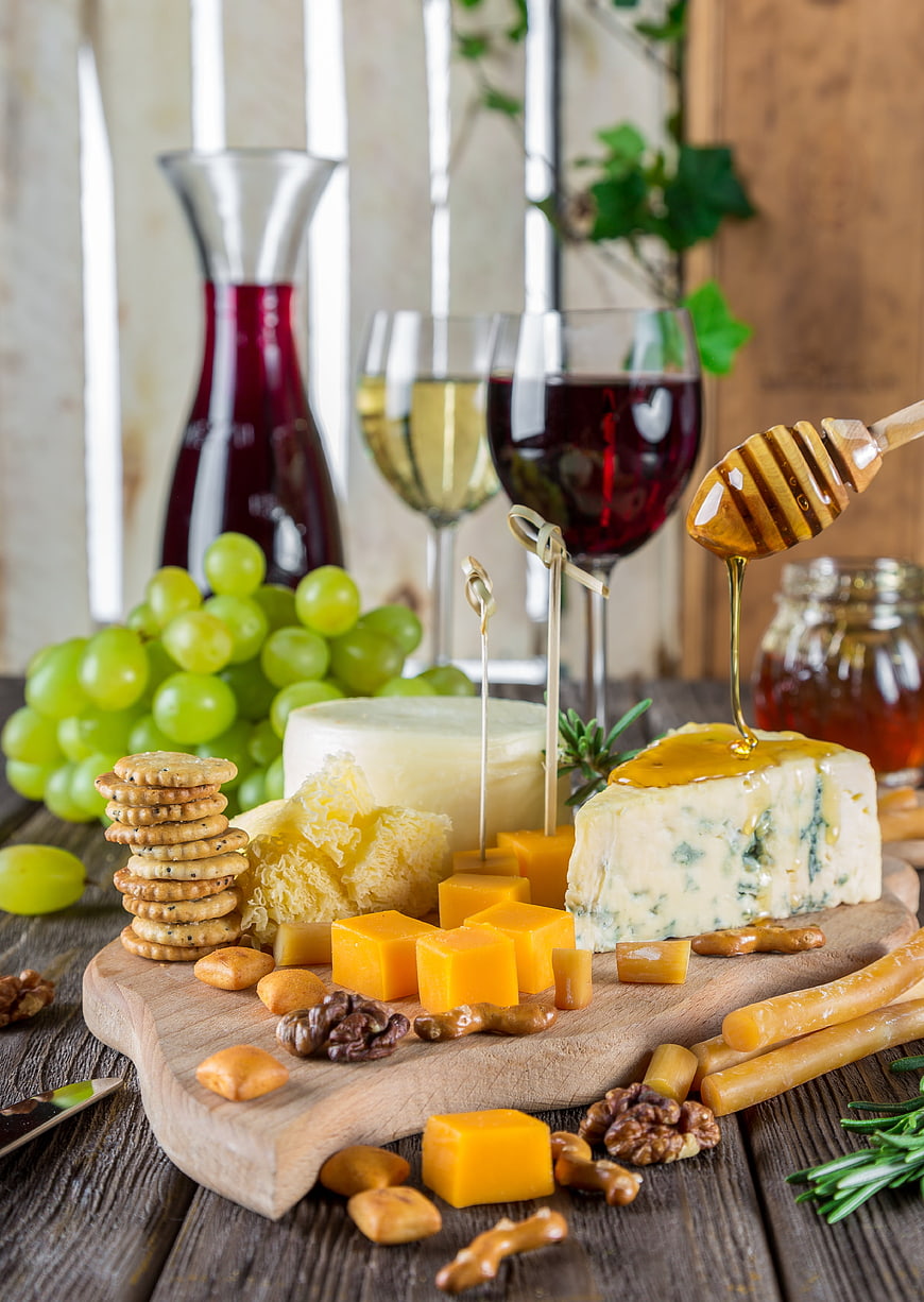 Rustic Cheese Board with Wine, Grapes, and Honey