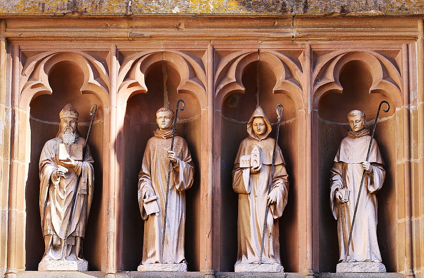 Four Stone Statues of Monks in Gothic Arches at Mariawald Abbey