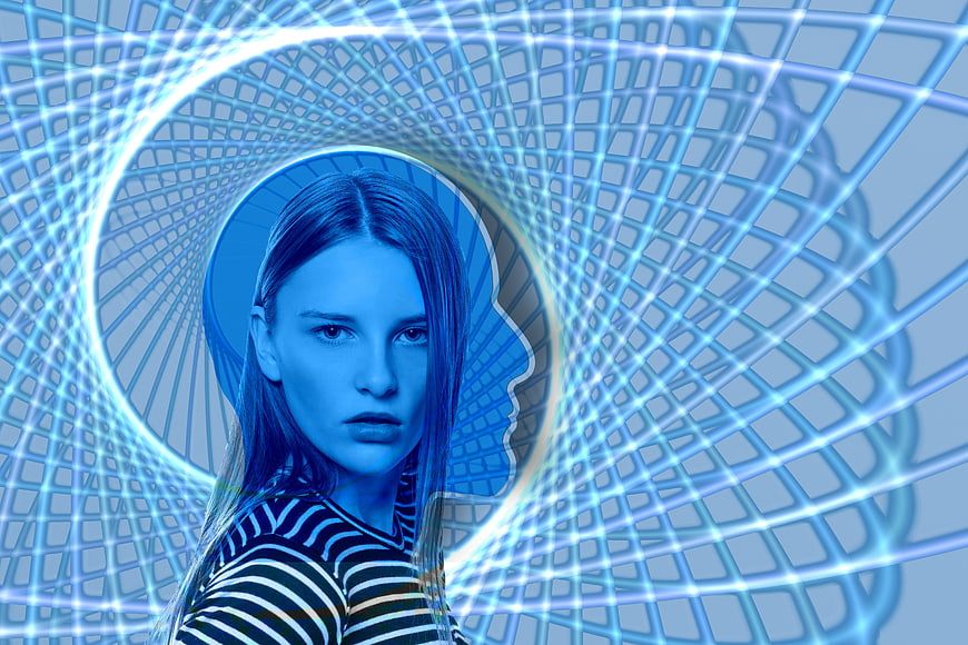 Woman with blue digital spiral tunnel background