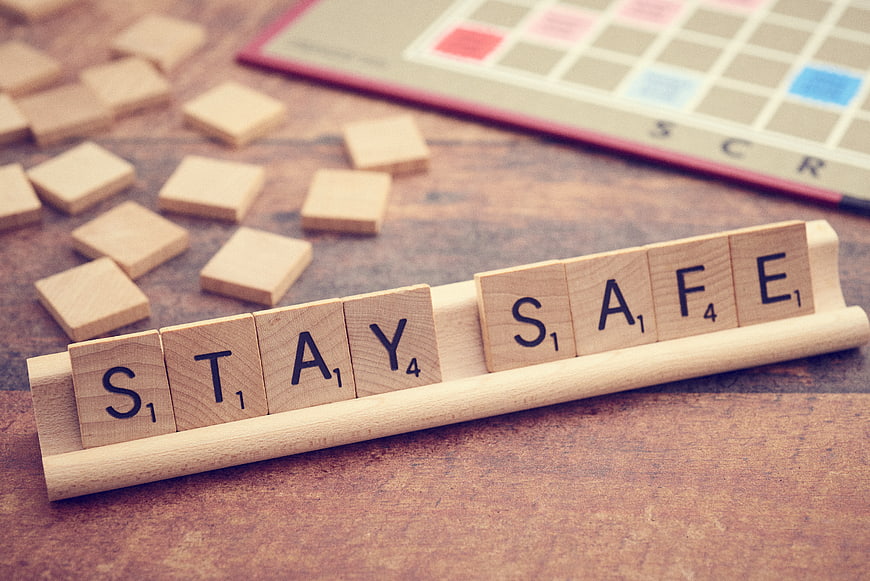 Stay Safe Scrabble Tiles on Wooden Rack