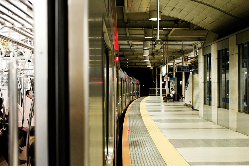 Subway train at station platform with passengers