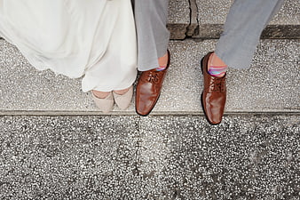 Top View of Wedding Couple Feet on Concrete Steps