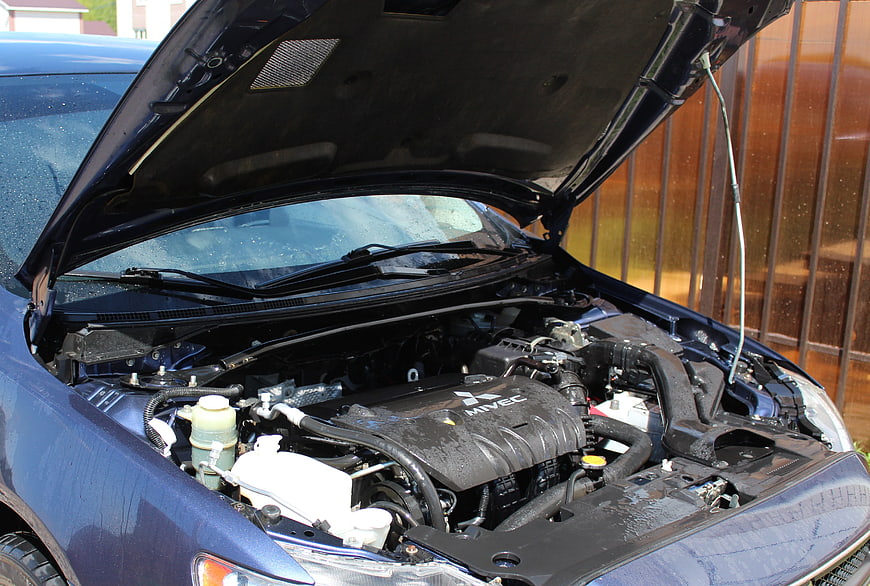 Blue Mitsubishi Lancer Engine Bay with Open Hood
